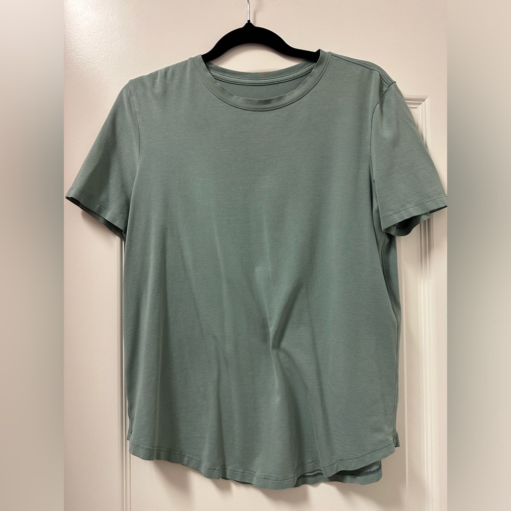 Lululemon teal blue green top fits like small
